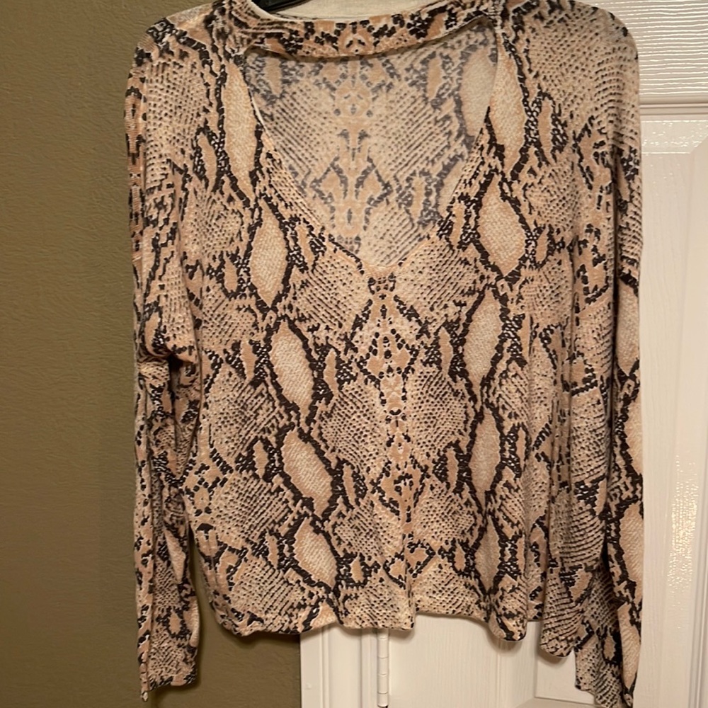 Snake print sweater with neck cutout